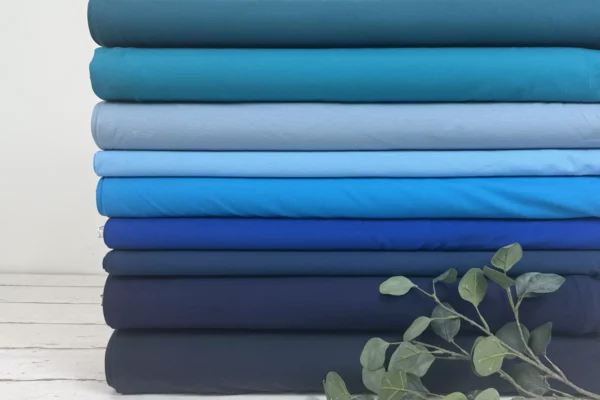 Jersey Stoff in Uni blau und petrol Farben