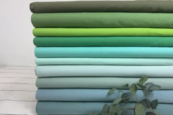 Jersey Stoff in Uni grün und mint Farben