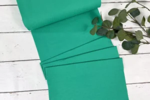 Feinripp Bündchen Stoff in uni grasgrün 35cm