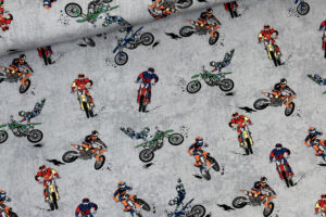 French Terry Stoff für Teenager mit Motocross Muster in hellgrau