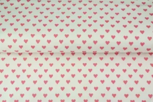 Baumwolljersey mit rosa Herzen in der Farbe weiß