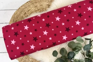 Baumwolljersey mit bunten Sternen in der Farbe pink