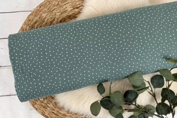 Musselin Stoff mit weißen Punkten in mint