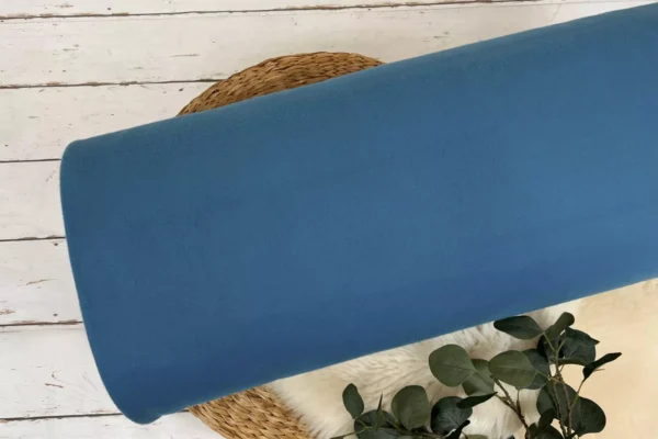 Kuschelweicher Baumwollfleece Stoff in der Uni Farbe türkisblau