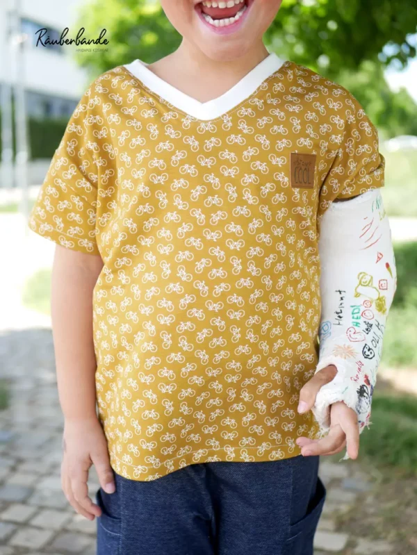 Tragebild Jersey Stoff mit kleinen Fahrrad Motiven in senfgelb