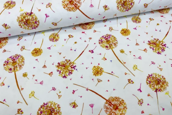 Jersey Stoff mit goldenen und pinken Pusteblumen in weiß