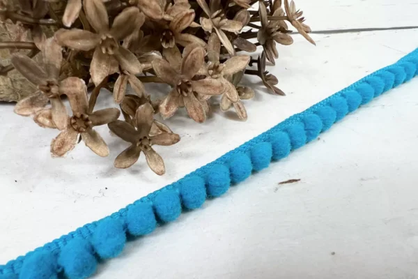 PomPon Borte 6mm türkis