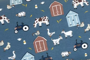 Jersey Stoff mit Bauernhof Motiv in jeansblau