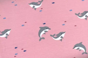 Jersey Stoff mit Delfin Motiven in rosa