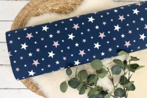 Baumwolljersey mit bunten Sternen in der Farbe blau