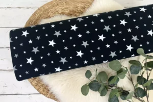 Baumwolljersey mit bunten Sternen in der Farbe schwarz