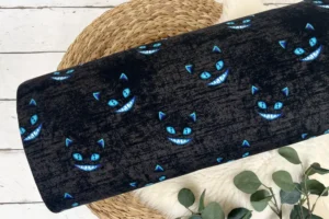 Alpensweat Stoff mit cooler Grinsekatze in schwarz meliert