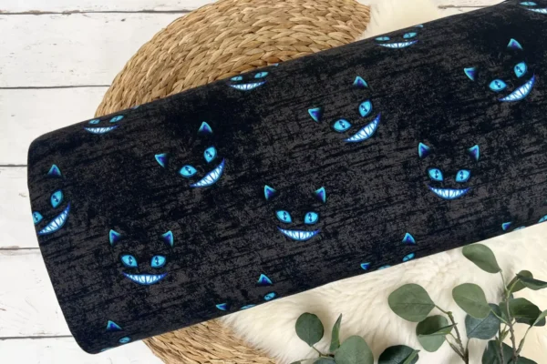 Alpensweat Stoff mit cooler Grinsekatze in schwarz meliert