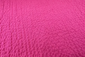 Viskose Stoff mit Crepe Struktur in pink