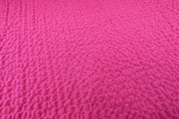 Viskose Stoff mit Crepe Struktur in pink