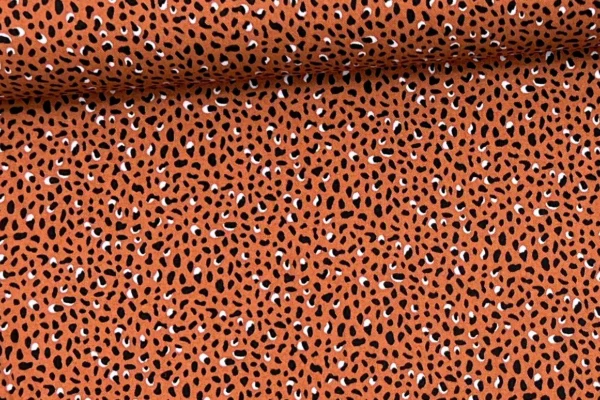 elastischer Viskosejersey Stoff mit Leoprint in rost. Ein perfekter Stoff zum nächen von Damenkleider und Blusen.