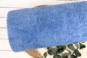 kuschelig warmer Teddystoff aus Baumwoll in Uni blau