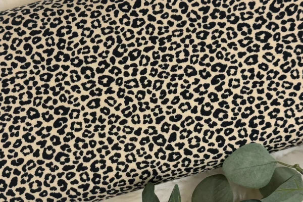 French Terry Stoff mit Leoprint Muster in beige