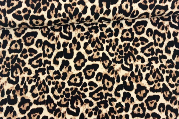 Sweat Stoff mit Leoprint Muster